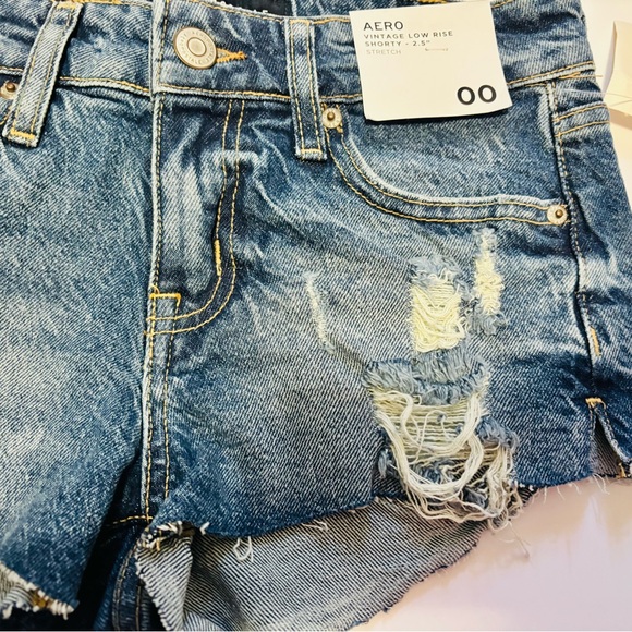 Aeropostale Women's Frayed Distressed Denim Shorts - Blue. Low rise stretch - Picture 3 of 3